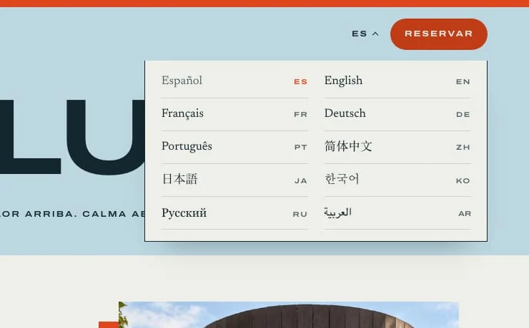 Menú de idiomas abierto con diez idiomas: español, inglés, francés, alemán, portugués, chino, japonés, coreano, ruso y árabe